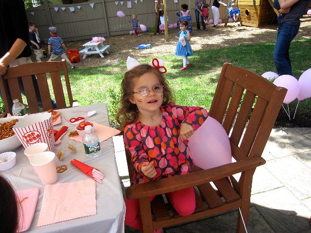 IMG_6126.jpg - Catie Ann, meanwhile, was focused on the fruit, crackers, candy and cupcakes.