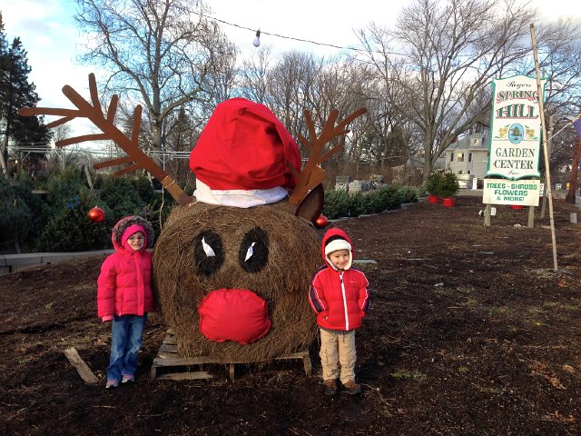 IMG_2347.jpg - Great fun on a chilly day.  How often do you get to pose with a Rudolph made from a round bale?