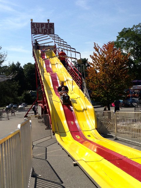 IMG_4132.jpg - Nathan and Daddy grab a ride on the slide.