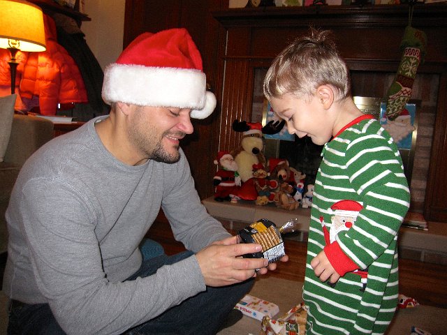 IMG_3361.jpg - He also helped Daddy with his stocking stuffers, Stroopwafels.